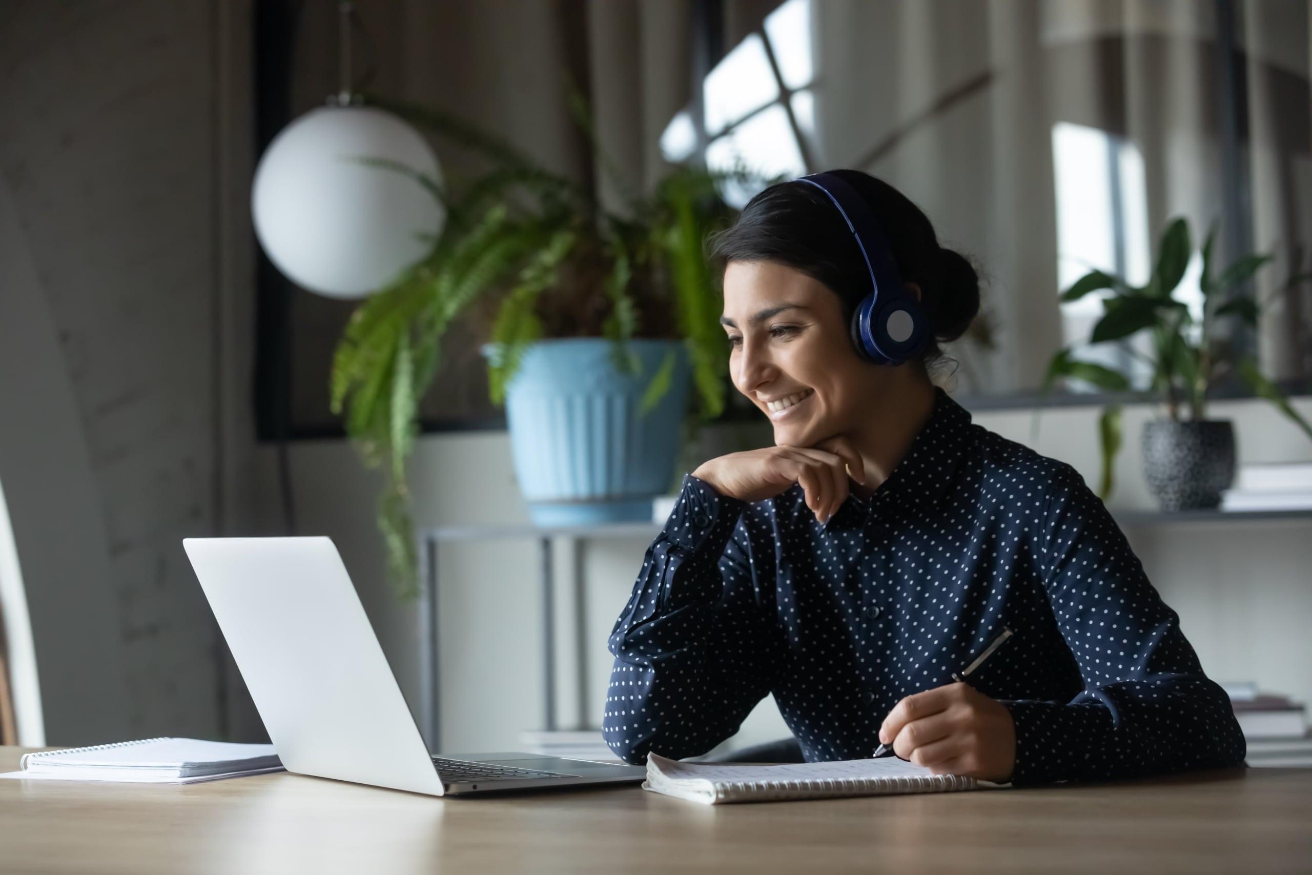 Young Indian woman using a laptop